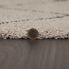 Tapis crème au motif géométrique zigzag gris