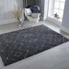 Tapis gris foncé au motif géométrique zigzag ivoire