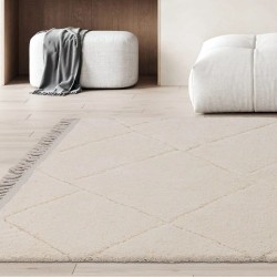 Tapis ivoire structuré  à franges d'inspiration berbère