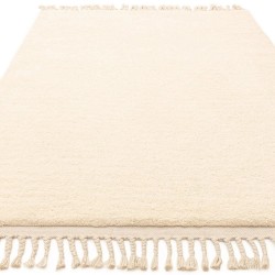 Tapis ivoire à franges d'inspiration berbère