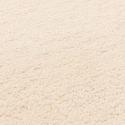Tapis ivoire à franges d'inspiration berbère