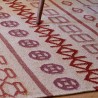Tapis kilim en laine beige aux motifs multicolores