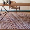 Tapis kilim en laine beige aux motifs multicolores