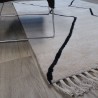 Tapis en laine beige frangé style berbère