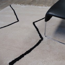 Tapis en laine beige frangé style berbère