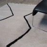 Tapis en laine beige frangé style berbère
